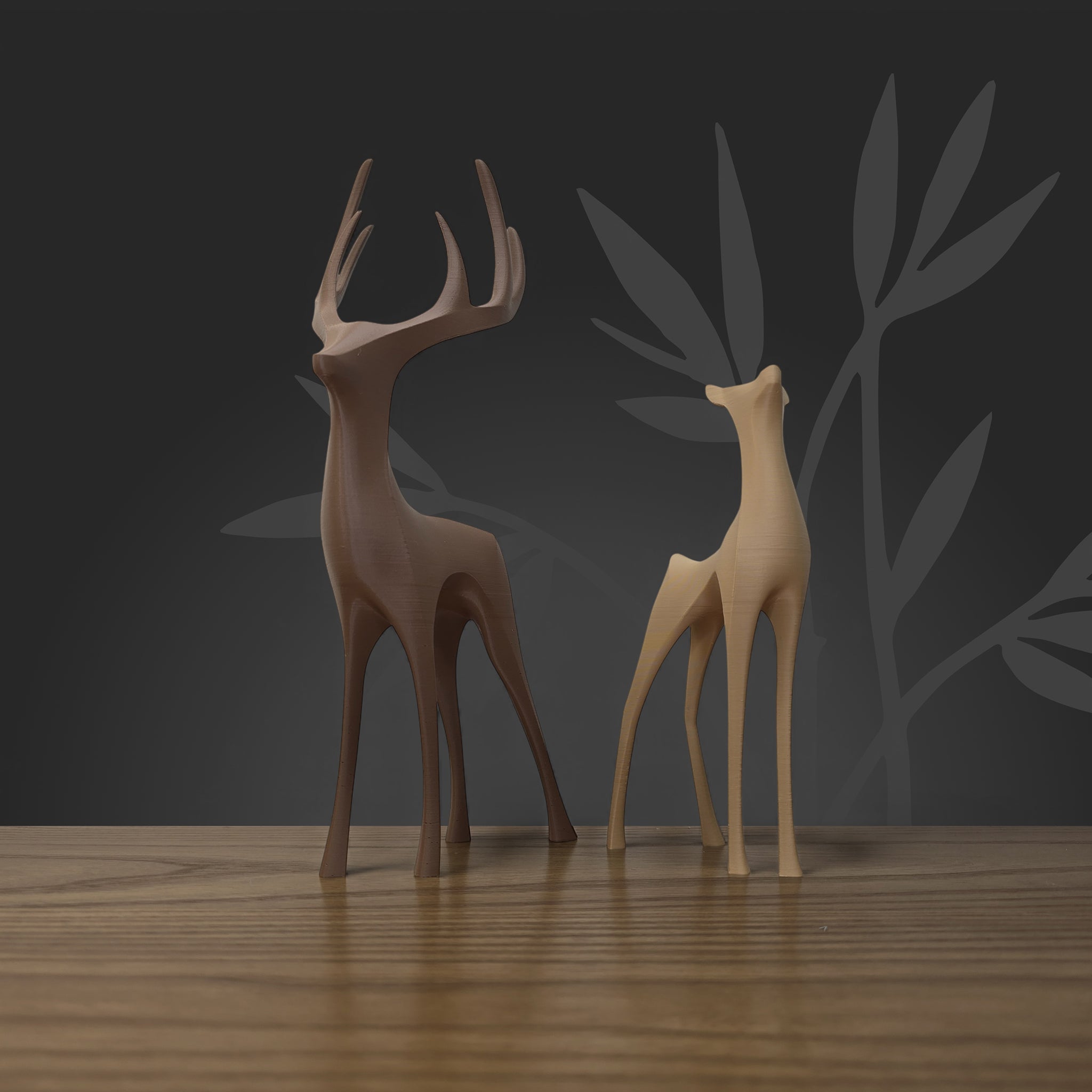 Détail de la silhouette d'un couple de cerfs design, finition mate haut de gamme pour intérieur chic.
